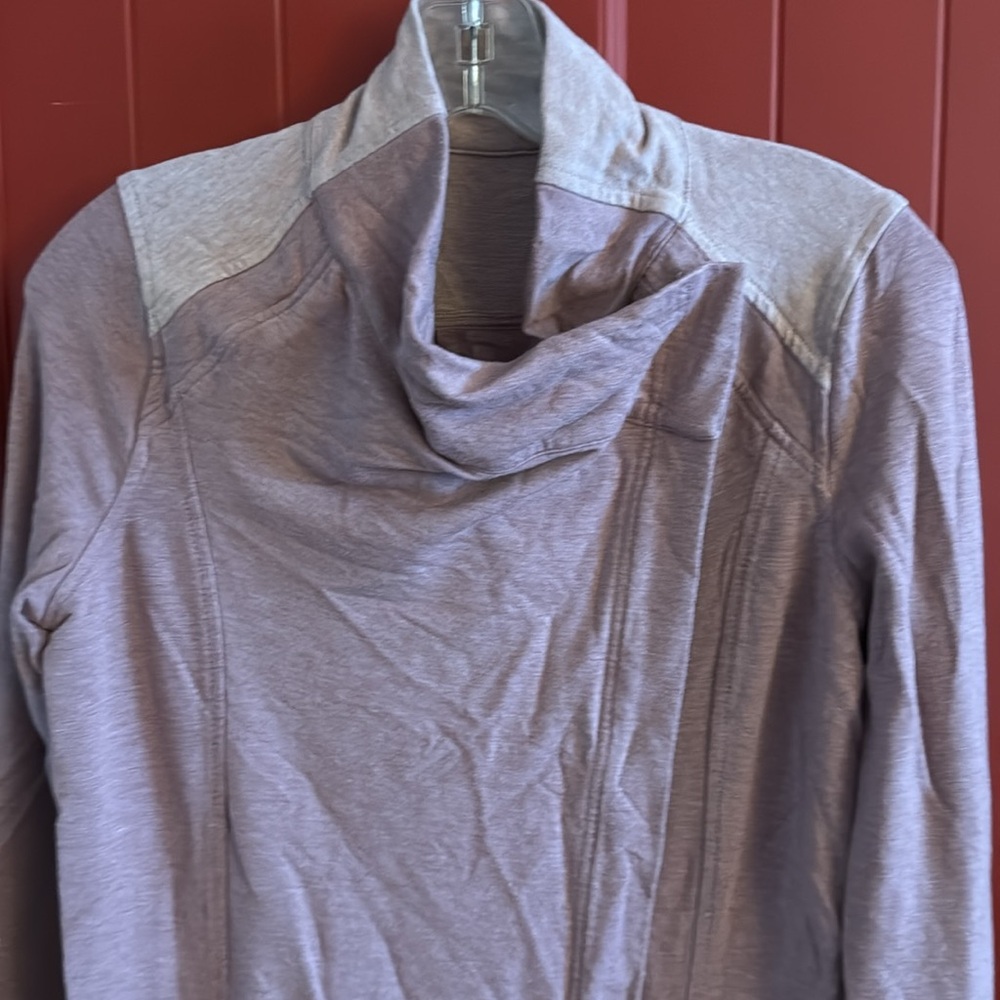 Lululemon Coast Wrap Sweater Size 6
Two tones of purple with button closure